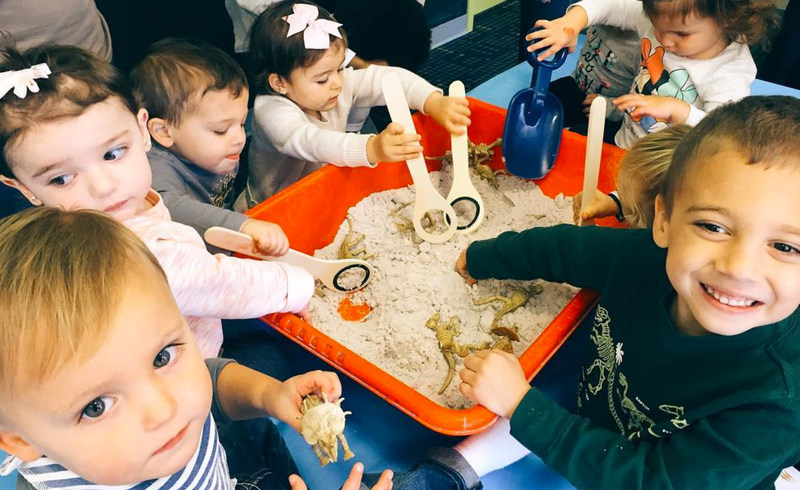 kids in digging bin exploration