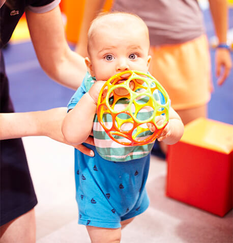 baby walking ball in gym text image block