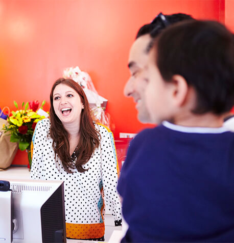 front desk service smiling people text image block