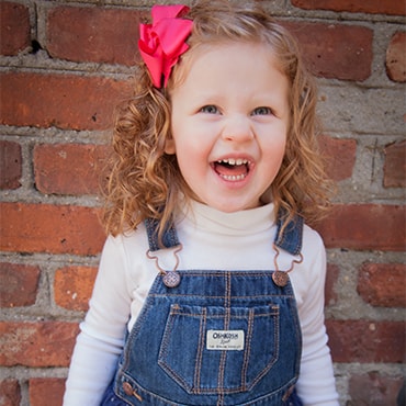 preschool photo day smiling curly haired girl quote-min