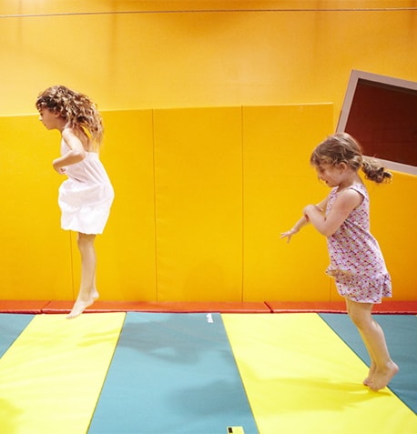 girls jumping gym trampoline tumbl trak text image block-min