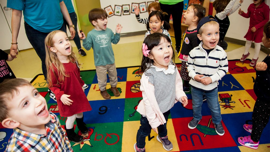 children singing preschool carpet dancing cta full width (1)