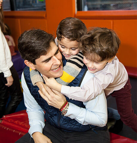 Boys-Hugging-Dad-Text-Box-Photo